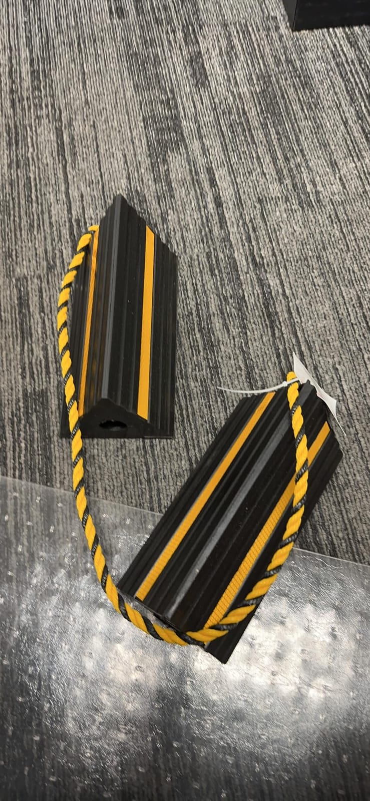 MaxxHaul 50019 Heavy Duty 3-Sided Rubber Wheel Chock with Yellow Reflective Strips and Nylon Rope and Non-Slip Base - 1 Pair customer photo 1