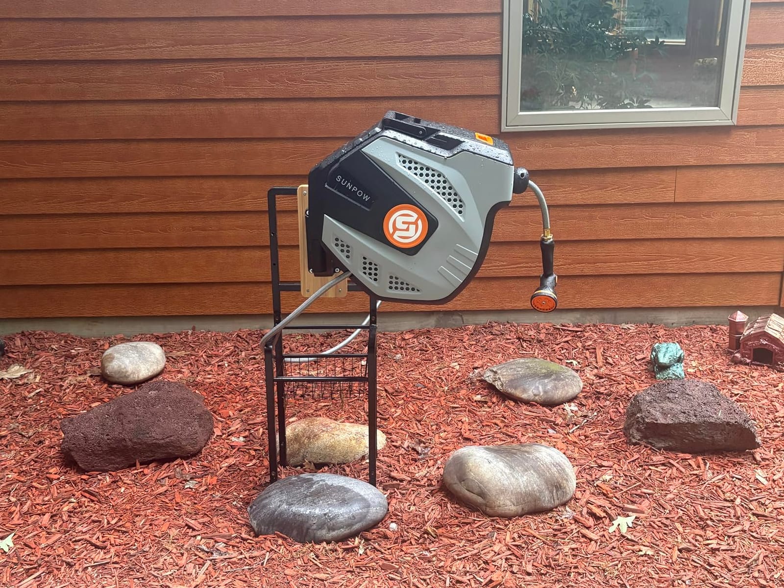 SUNPOW Retractable Garden Hose Reel - 1/2 inch x 50ft Heavy Duty Wall Mounted Hose Reel with 3/4 inch Brass Fitting & 10 Sprayer Nozzle - Any Length Lock, Auto Rewind System, 180°Swivel Bracket- Grey customer photo 1
