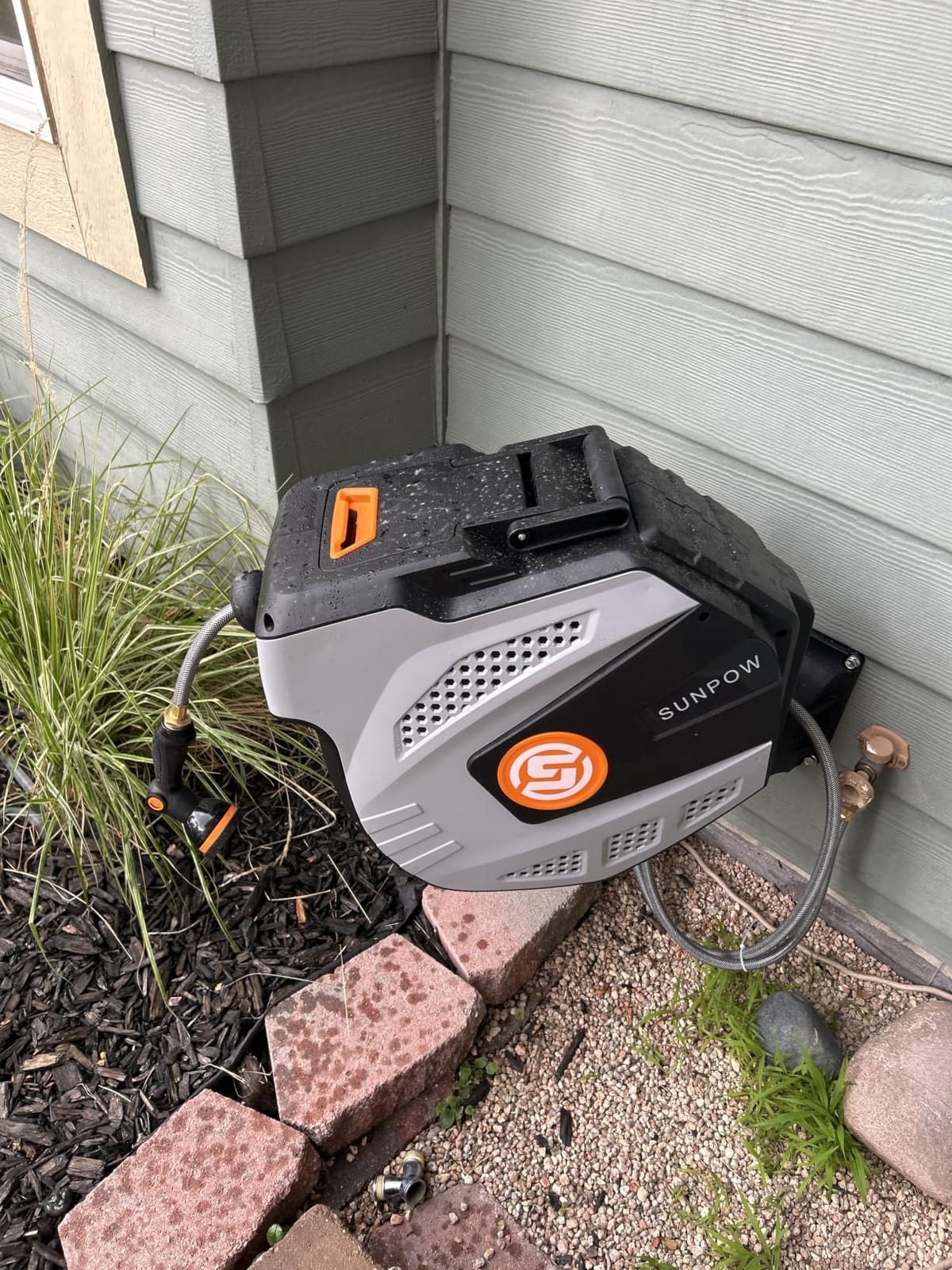SUNPOW Retractable Garden Hose Reel - 1/2 inch x 50ft Heavy Duty Wall Mounted Hose Reel with 3/4 inch Brass Fitting & 10 Sprayer Nozzle - Any Length Lock, Auto Rewind System, 180°Swivel Bracket- Grey customer photo 2
