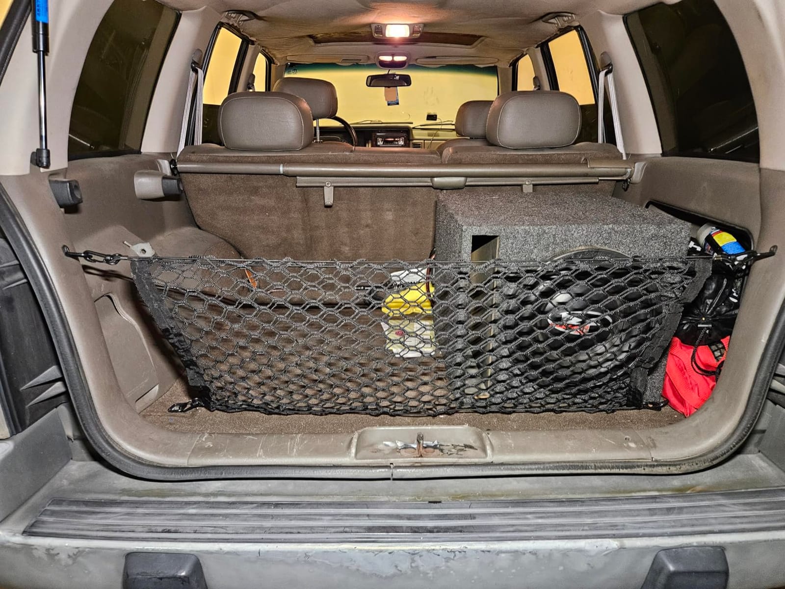 Amiss Cargo Net Stretchable, Car Exterior Accessories, Adjustable Elastic Trunk Storage Net with Hook for SUVs, Cars and Trucks (35.4x15.8 Inch) customer photo 2